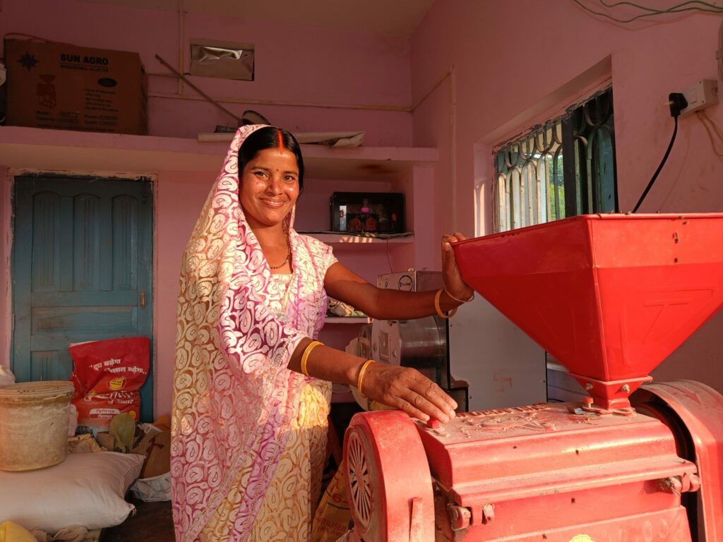 Reena Devi working at her mill