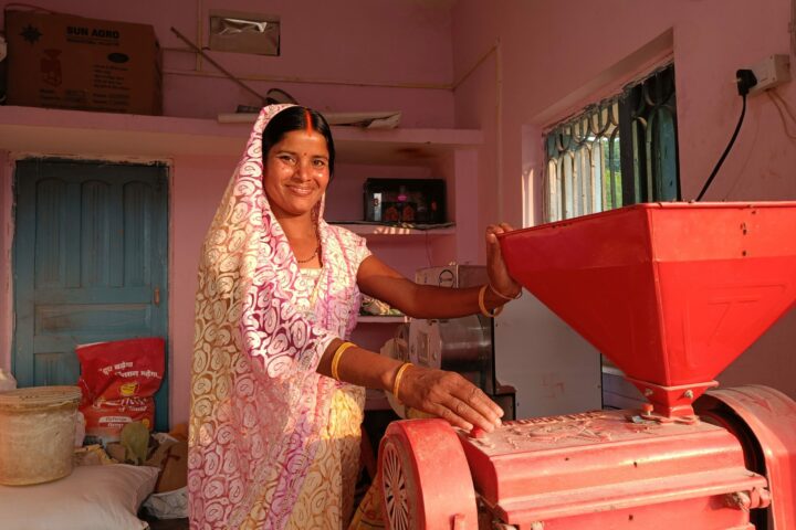 Reena Devi working at her mill