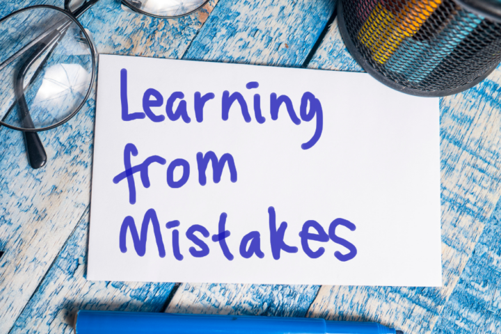 Learning from mistakes written with a marker on note paper