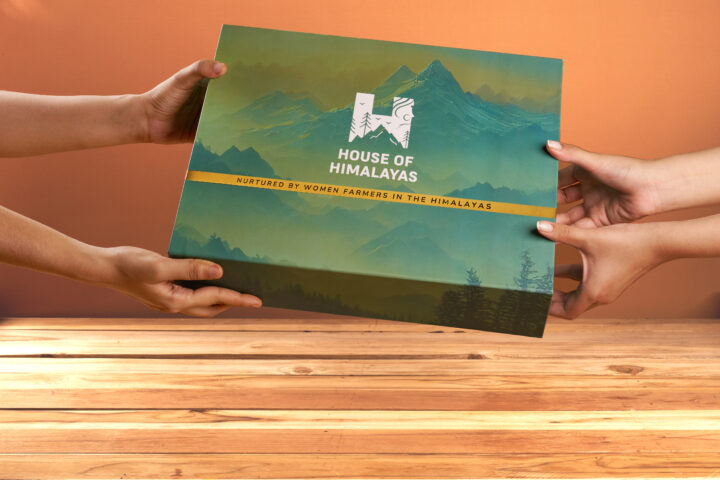 A House of Himalayas gift box being held by two people